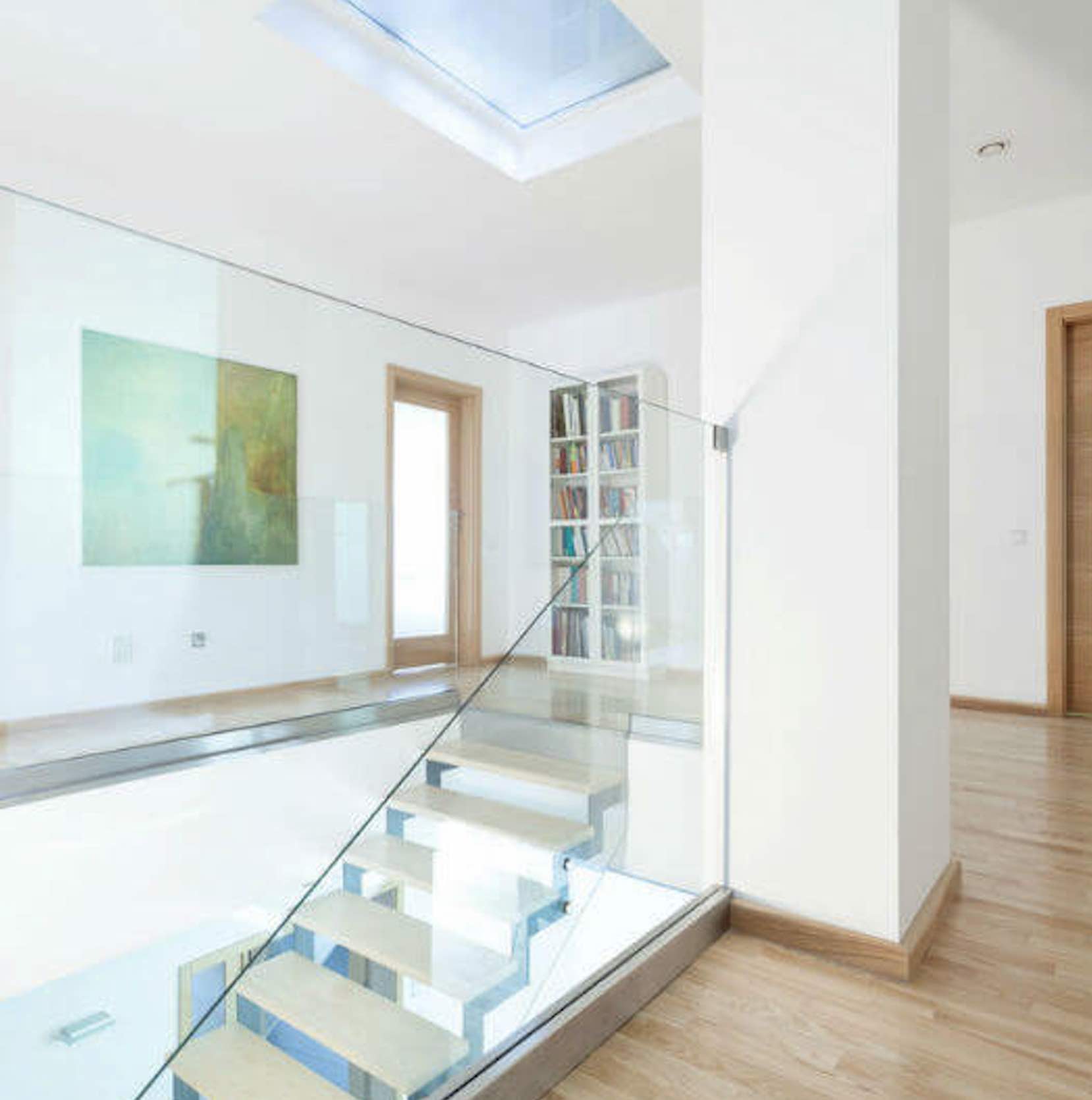 Mezzanine Glass Balustrades Secure The Edges Of An Open Storey And Showcase mezzanine-glass-balustrades-secure-the-edges-of-an-open-storey-and-showcase